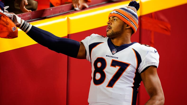 Noah Fant gives glove to fan after Broncos game at Arrowhead