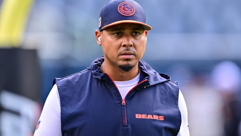 Bears GM Ryan Poles watches warmups before a preseason game at Soldier Field.