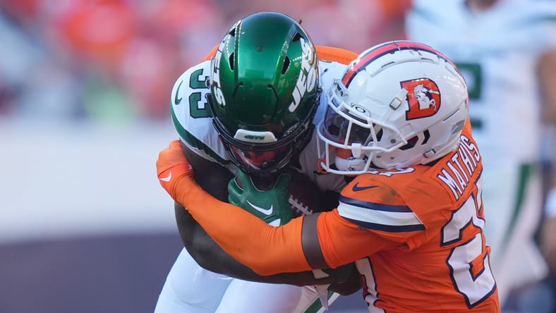 Denver CB Damrri Mathis tackling Dalvin Cook
