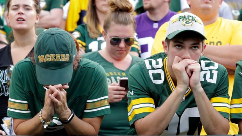 Green Bay Packers fans react nervously late in the game vs. Vikings.