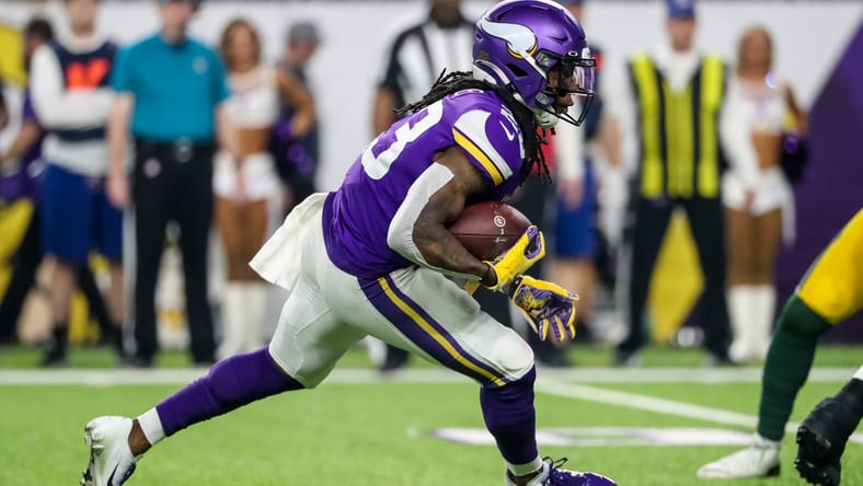 Mike Boone runs ball during first quarter vs Packers.