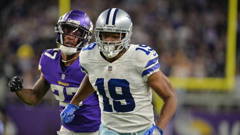 Amari Cooper makes a play against Cameron Dantzler in 2021.