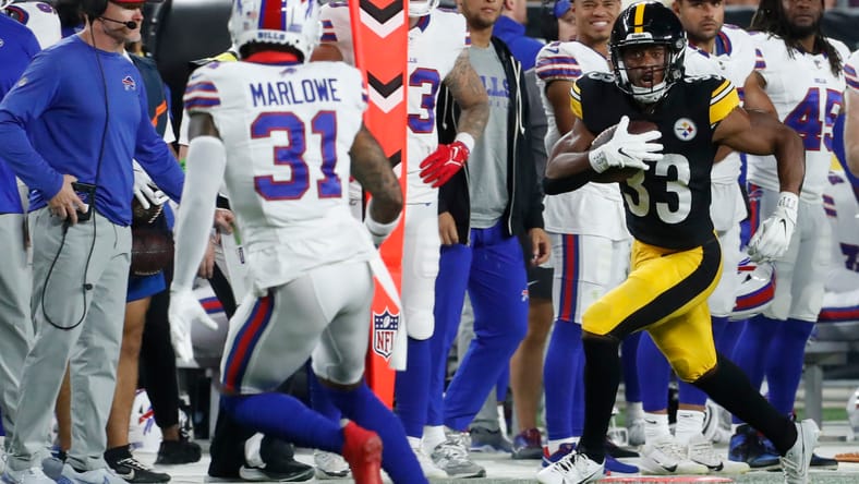 Xazavian Valladay runs the ball against the Bills in 2023 preseason.