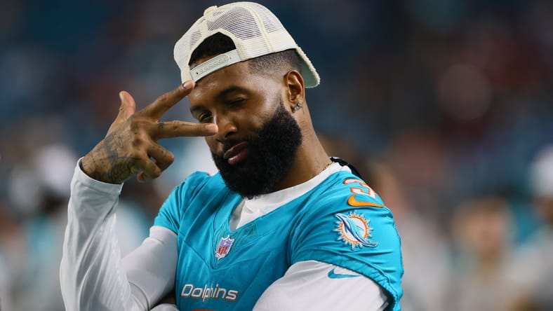 Odell Beckham Jr. reacts from the sideline during a Dolphins preseason game