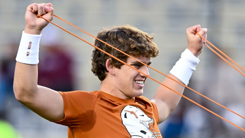 Arch Manning warms up before the game against Texas A&M.