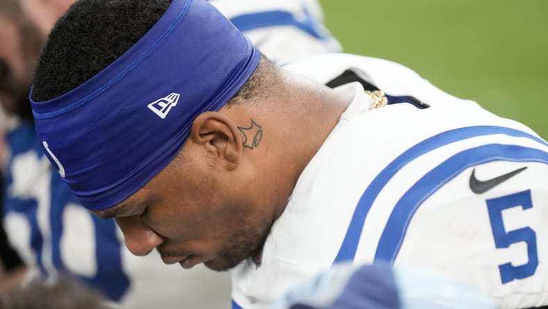 Anthony Richardson kneels in prayer after the Colts’ game versus the Titans, Dec 22, 2024.