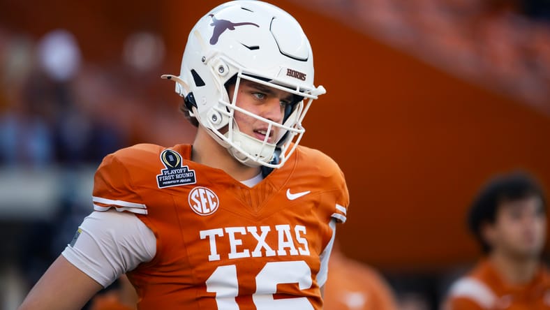 Arch Manning looks to pass against Clemson in the CFP playoff.