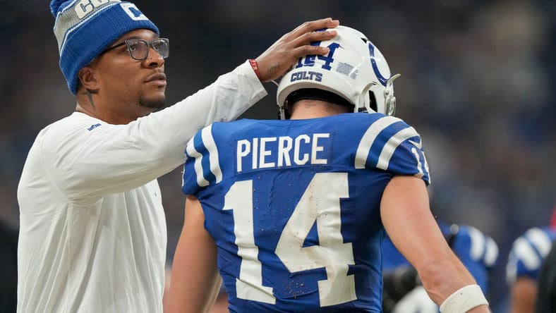Colts quarterback Anthony Richardson pats wide receiver Alec Pierce on the head as Pierce leaves the field against the Jacksonville Jaguars on January 5, 2025.
