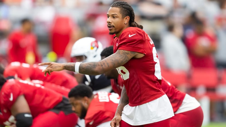 Trishton Jackson runs a route during Cardinals training camp.
