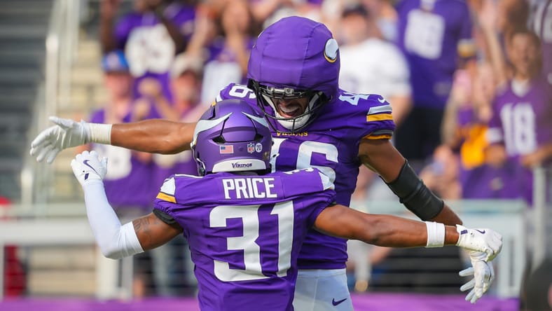 Myles Price and Bryson Nesbit celebrate a touchdown.