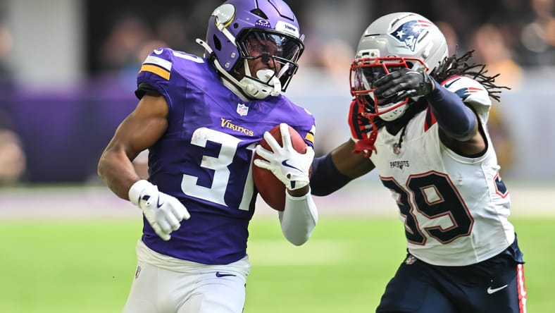 Myles Price returns a kickoff as Jordan Polk pursues.