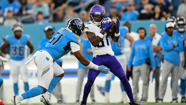 Lucky Jackson makes a catch against Titans at Nissan Stadium.