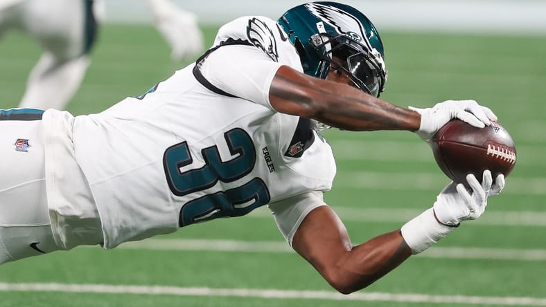 Lewis Cine intercepts pass for Eagles against Jets at MetLife Stadium.