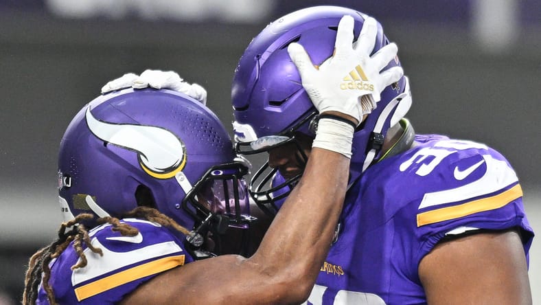 Minnesota Vikings backs C..J. Ham and Aaron Jones in 2024