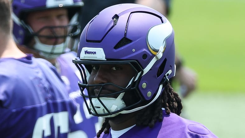 Donovan Jackson practicing at Vikings minicamp in Minneapolis.