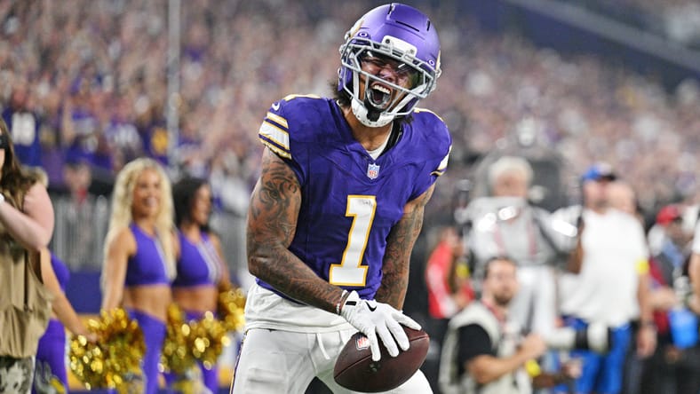 Jalen Nailor catches a pass for the Vikings in Week 2 of 2025