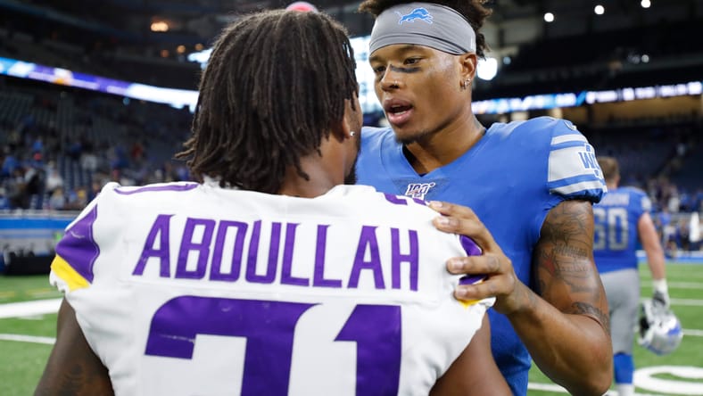 Marvin Jones talks with Ameer Abdullah after Lions vs. Vikings at Ford Field.