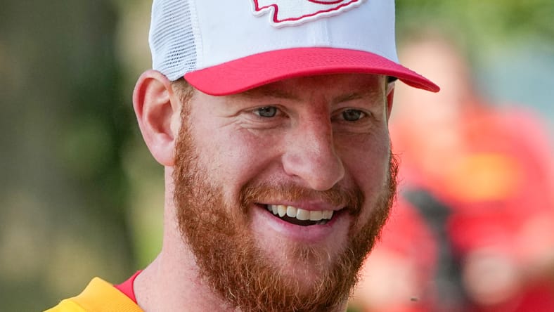 Carson Wentz walks to practice at Chiefs training camp.