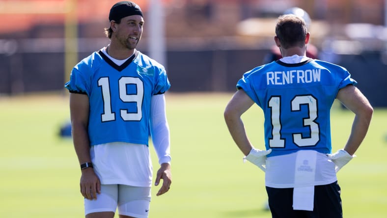 Adam Thielen talks with Hunter Renfrow at Panthers training camp.