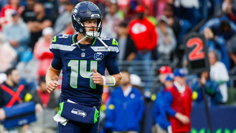 Sam Darnold reacts after a Seahawks rushing touchdown against the Chiefs at Lumen Field.