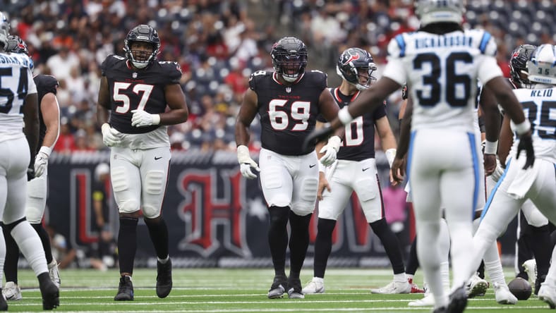 Blake Fisher and Ed Ingram line up on the Texans offensive line against the Panthers at NRG Stadium.