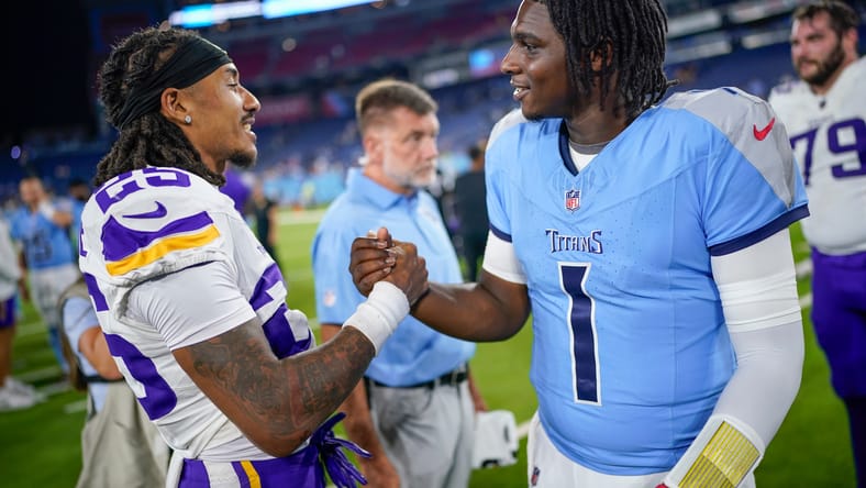 Cam Ward and Kahlef Hailassie shake hands after Titans-Vikings preseason game in 2025.