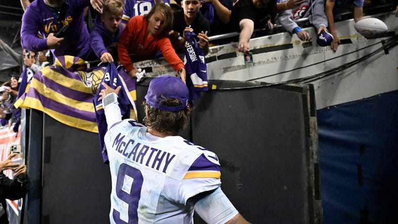 J.J. McCarthy reacts after defeating the Bears at Soldier Field.