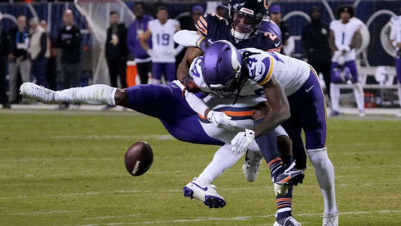 Jay Ward knocks the ball loose from DJ Moore during the Vikings-Bears game.