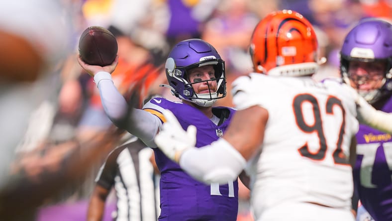 Carson Wentz throwing pass against Bengals defense in Minneapolis.