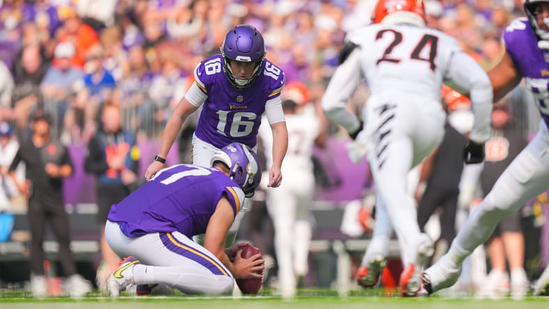 Will Reichard attempts field goal with Ryan Wright holding against Bengals.