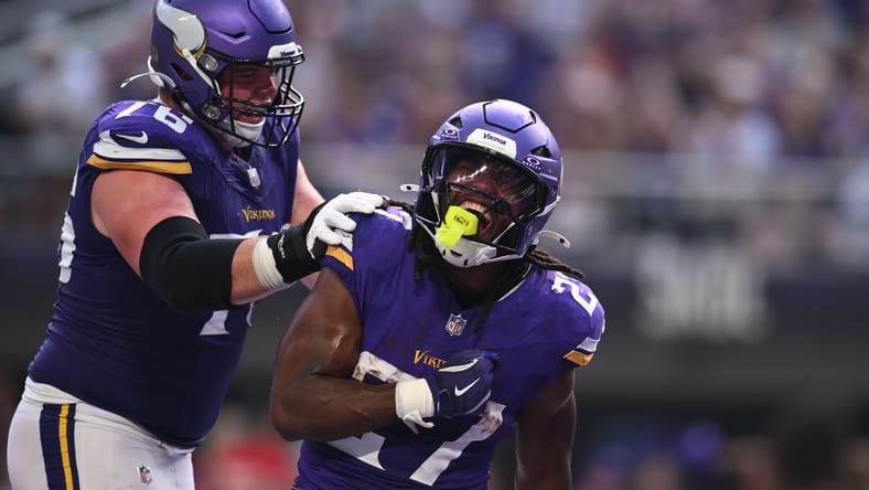 Jordan Mason celebrates touchdown with Will Fries versus Bengals.