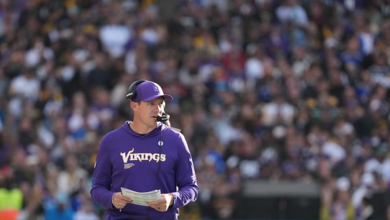 Kevin O’Connell walks sideline during Vikings-Steelers game in Dublin.