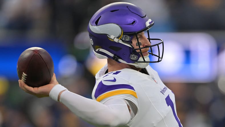 Carson Wentz drops back to pass during the Vikings’ first half against the Chargers at SoFi Stadium in Inglewood.