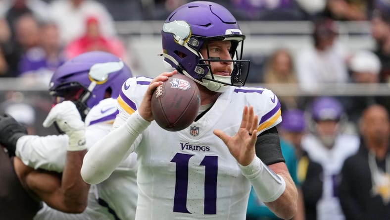 Carson Wentz drops back to pass for Vikings against Browns in London.