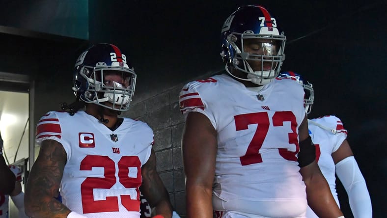 Giants’ Xavier McKinney and Evan Neal in action versus the Eagles.