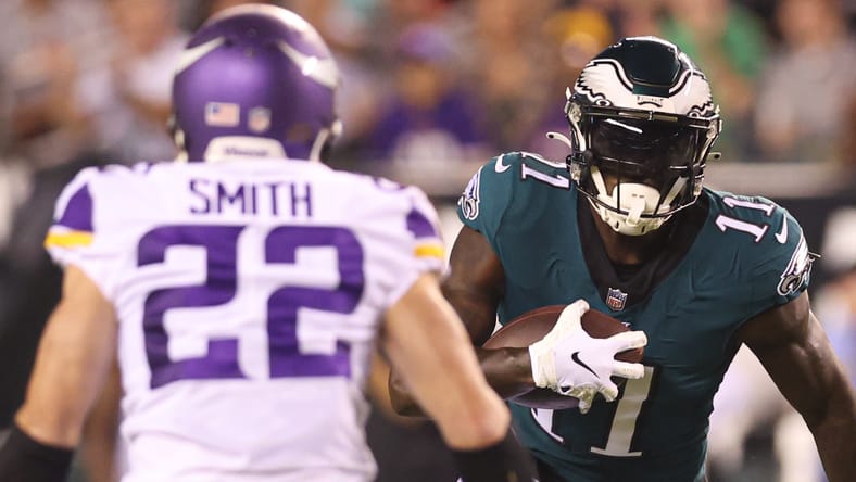 A.J. Brown runs with the ball as Harrison Smith pursues during the Eagles’ home game against the Vikings.