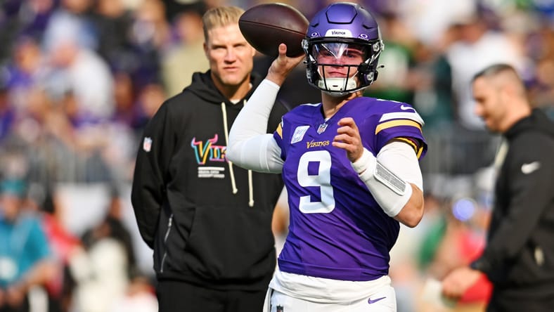 Vikings QB J.J. McCarthy in 2025, warming up before MIN-PHI