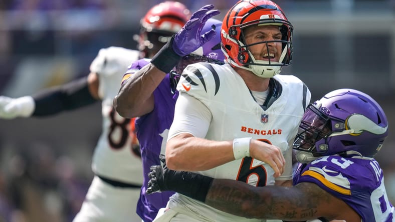 Minnesota Vikings DT Jonathan Allen gets a QB hit on CIN QB Jake Browning