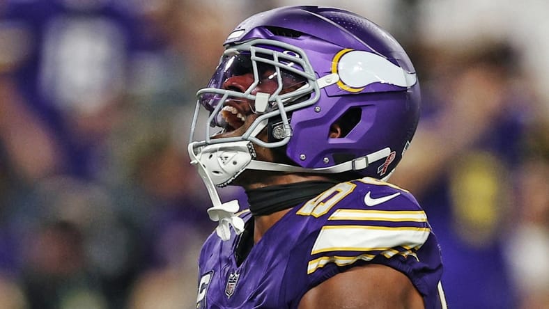 Jonathan Greenard celebrates after a sack against the Falcons at U.S. Bank Stadium.
