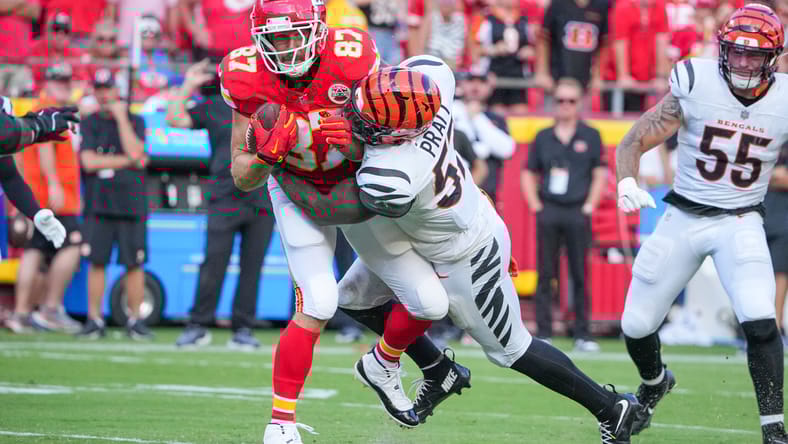 Germaine Pratt tackles Travis Kelce after reception during Bengals vs. Chiefs.