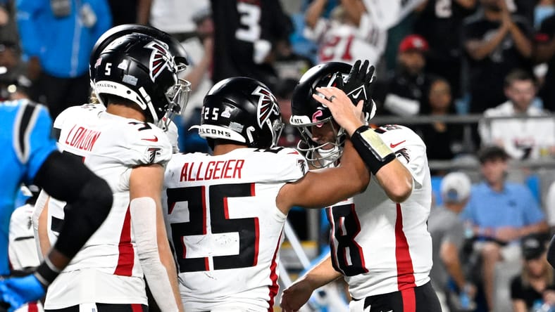 Falcons RB Tyler Allgeier and QB Kirk Cousins in 2024.