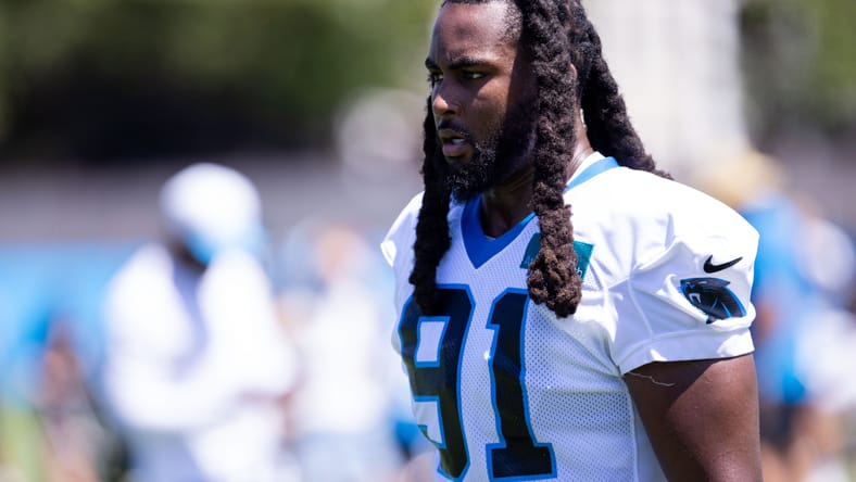 Pat Jones II leaves the field after Carolina Panthers training camp practice.