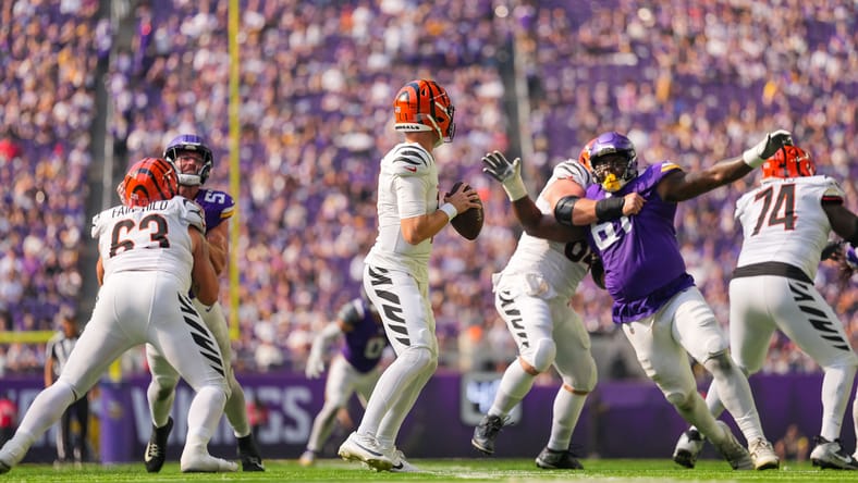 Bengals quarterback Brett Rypien throws from the pocket against the Vikings