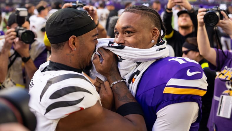 Ja’Marr Chase and Justin Jefferson hug after a game at U.S. Bank Stadium.