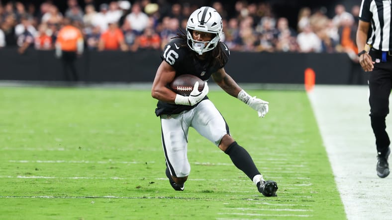 Jakobi Meyers runs after the catch during the Raiders-Bears game at Allegiant Stadium.