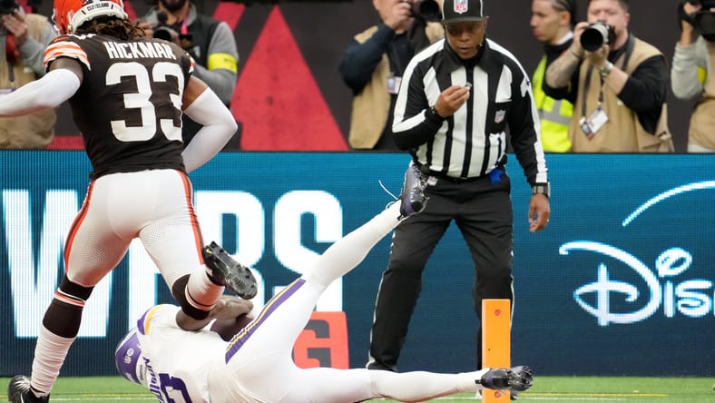 Jordan Addison makes a touchdown catch in the fourth quarter against the Browns in London on Oct. 5, 2025.