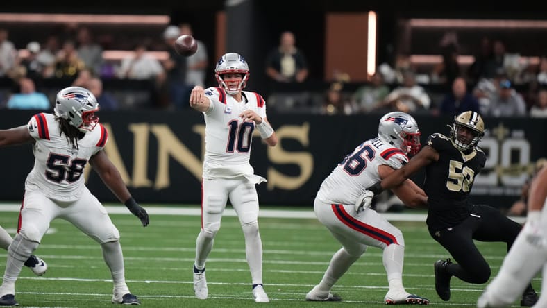 Drake Maye throws a pass during the Patriots-Saints matchup at Caesars Superdome.