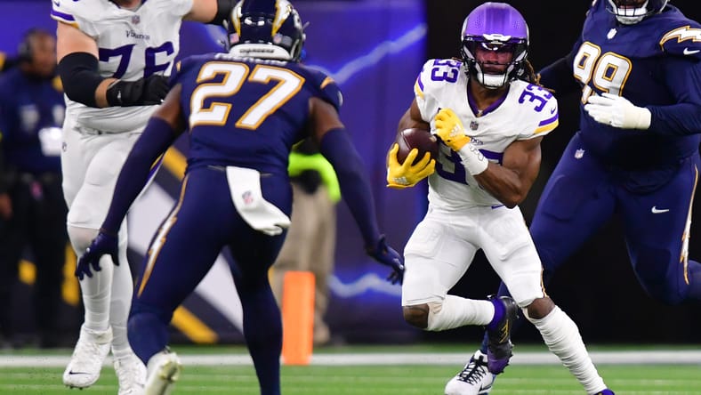 Aaron Jones Sr. runs the ball during the Vikings’ second-half drive against the Chargers at SoFi Stadium.