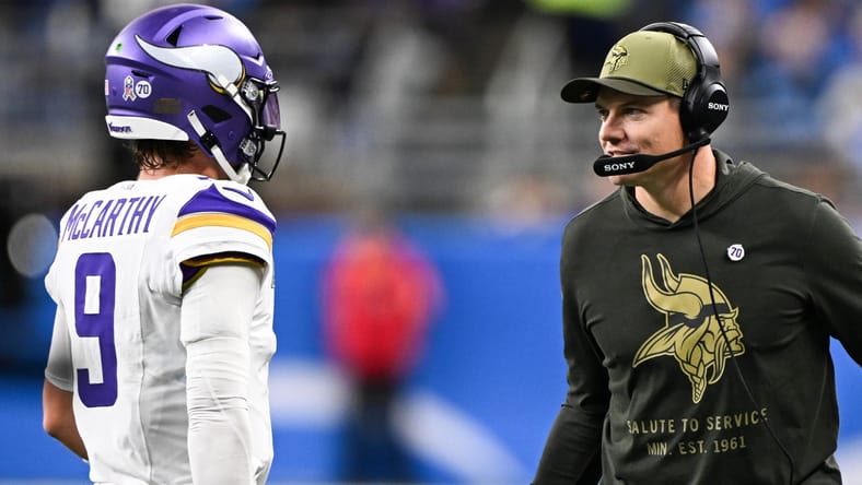 J.J. McCarthy and Kevin O'Connell, Vikings QB and HC, at Detroit in 2025.