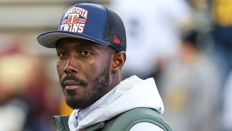Kwesi Adofo-Mensah watches from the sideline at Huntington Bank Stadium.